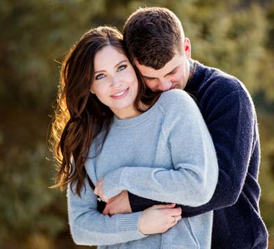 Couple embracing for photo